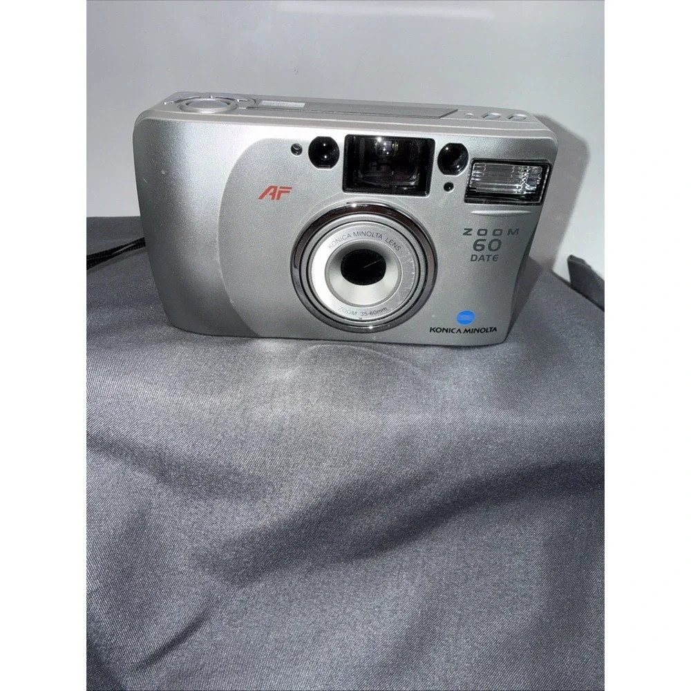 Konica Minolta Zoom 60 Date 35mm Film Camera | Working Turns On And Zooms In.